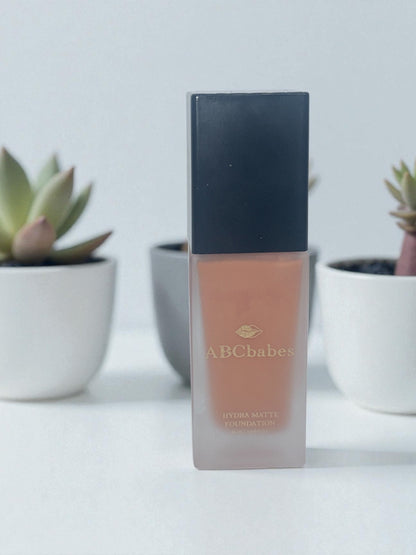 ABCbabes deep tan shade #34 with neutral undertones hydra matte foundation.