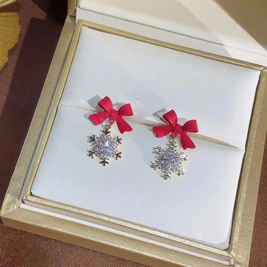 Silver Needle Zircon Snowflake Bow Earrings